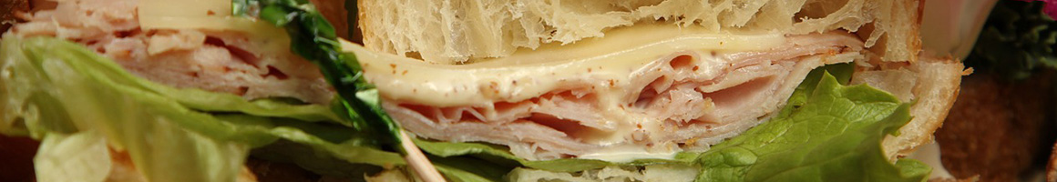 Eating Sandwich Pub Food at Saints Pub + Patio Waukee restaurant in Waukee, IA.